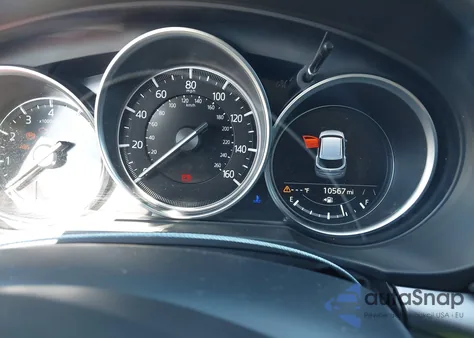 2021 Mazda Cx-5 Touring z USA, uszkodzony, nr VIN JM3KFACM6M1392680